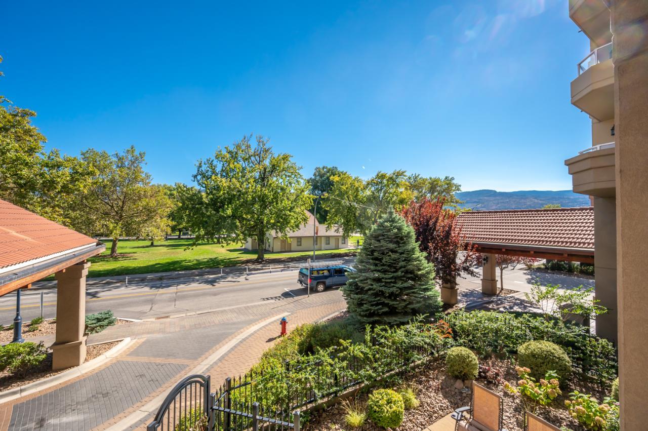 Spacious executive condo interior with hardwood floors and open plan